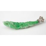 A white gold and diamond set jade brooch, carved and foliage, 7.5 cm