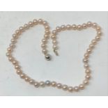 A white gold and cultured pearl necklace