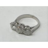 A large 18ct white gold and large three stone diamond ring, of approx. 3.22ct, ring size K1?2