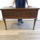 A fruitwood dresser, having two frieze drawers, on turned legs to splay feet, 127 cm wide Split to