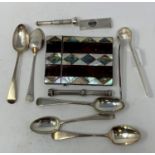 Five various silver spoons, various dates and makers, a Victorian visiting card case, slight loss,