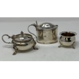 Two silver mustard pots, and a silver salt cellar, 8.6 ozt (weighable silver) (3)