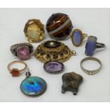 A silver coloured metal ring, with yellow stone, and various other costume jewellery (11)