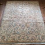 A Persian cream ground carpet, with main? form border, centre with repeated foliate forms, 248 x 313