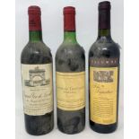 A bottle of Grand Vin de Leoville, 1985, a bottle of Chateau Trotanoy Pomerol, 1982 and a bottle