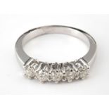 An 18ct gold five stone diamond ring, ring size M 1/2 Diamonds 0.5ct