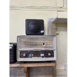 A Bush bakelite radio, five others, and a speaker (7)