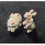 Two miniature silver rabbits Modern