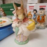 A Beswick Beatrix Potter figure, Mrs Rabbit, limited edition 492/1547, a set of Wade Flintstones