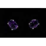 A pair of amethyst stud earrings