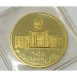 A gold Pahlavi Golden Jubilee medal, stamped 900, boxed 4.99 g