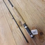 A carbon fibre fishing rod, and four other fishing rods, all with bags, various conditions (5)