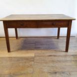 A fruitwood farmhouse table, with two frieze drawers, and two faux drawers, on square tapering legs,