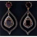 A pair of diamond and garnet drop earrings 40 mm total length