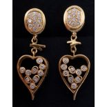 A pair of yellow gold and diamond set heart shaped drop earrings