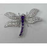 A silver and amethyst dragonfly brooch Modern