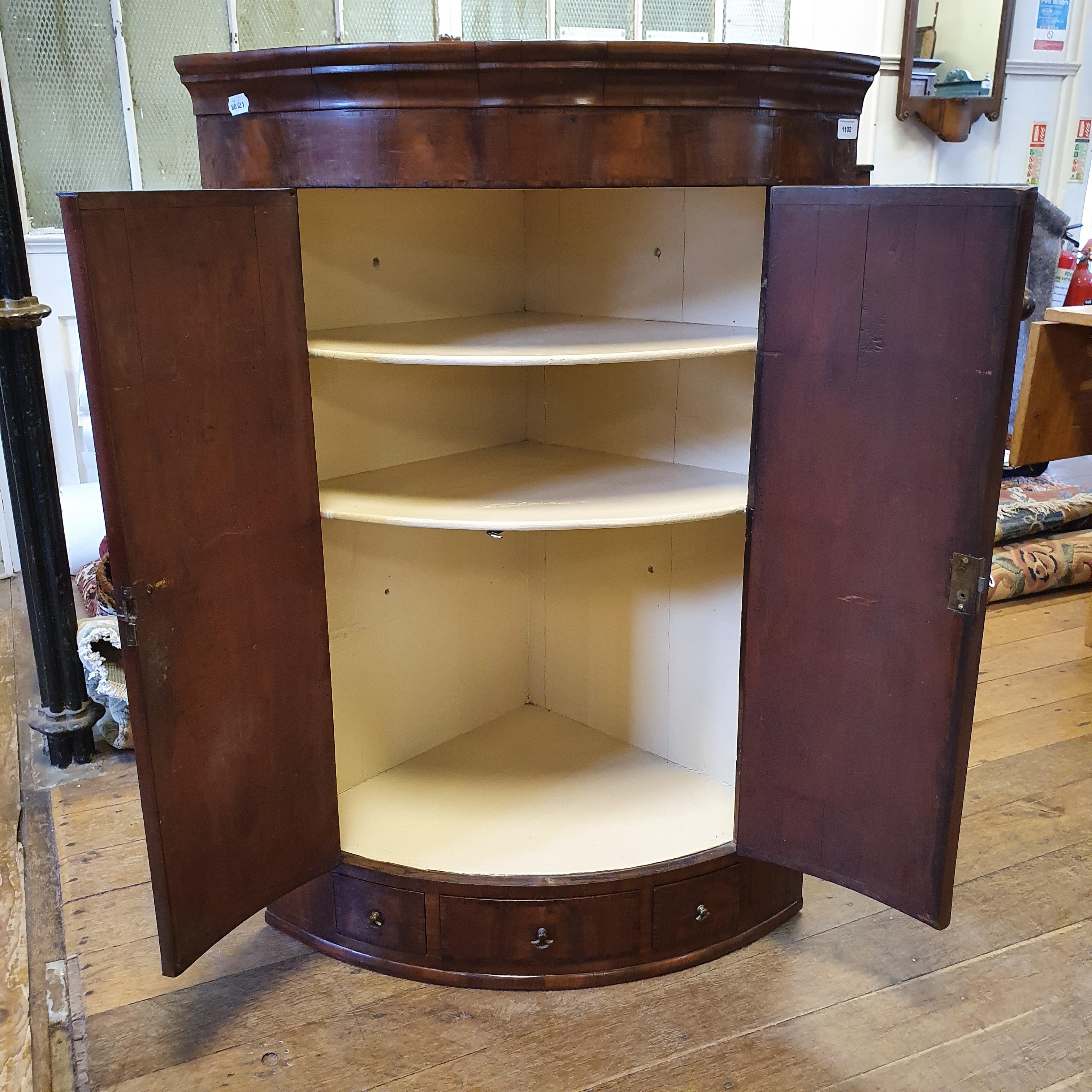 A 19th century mahogany bow fronted corner cabinet, having two drawers above three drawers, 80 cm - Image 2 of 3