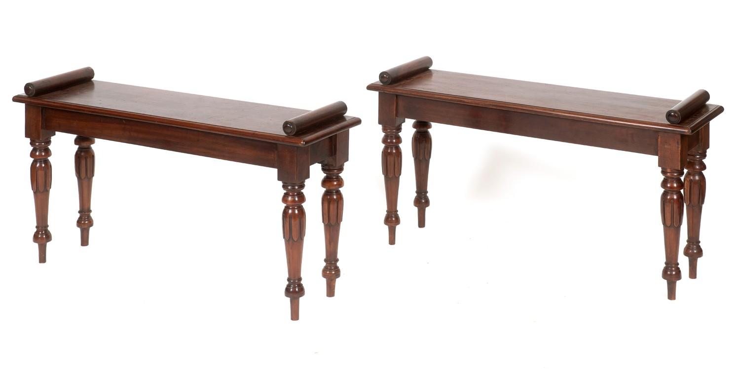 A pair of mahogany window seats, on turned tapering carved legs, 96 cm wide (2)