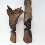 An African ebony carving of a woman, 59 cm high, and another 44 cm high (2) Believed to be Zambian