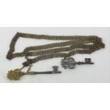 A large brass and steel key, surmounted with a coronet, repaired, probably 18th century, 15.5 cm,