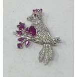 A silver ruby set bird brooch Modern