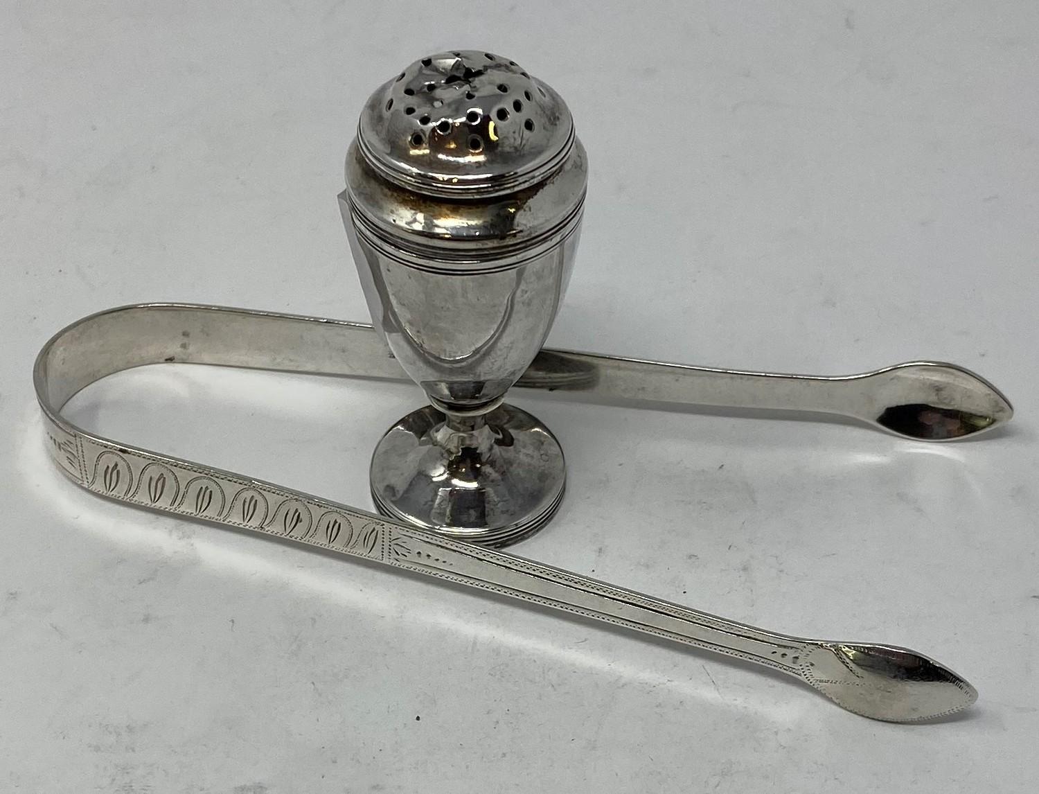 A pair of George III silver sugar tongs, initialed, with engraved decoration, Peter, Anne, and