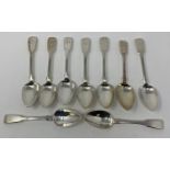 Nine silver fiddle pattern dessert spoons, initialed, various dates and makers, 12.2 ozt