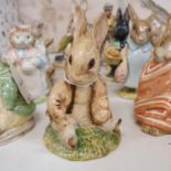 A Beswick Beatrix Potter figure, Benjamin Bunny, and nineteen other Beatrix potter figures (20)