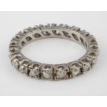 An 18ct white gold and diamond full eternity ring, approx. 1.1ct, ring size N1?2