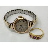 An 18ct gold, ruby and diamond chip ring, ring size L, and a ladies 9ct gold wristwatch, on a plated