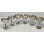A matched set of six Chinese silver coloured metal goblets, on bamboo stems, 26.9 ozt (6) a couple