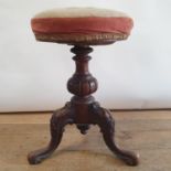 A 19th century mahogany piano stool