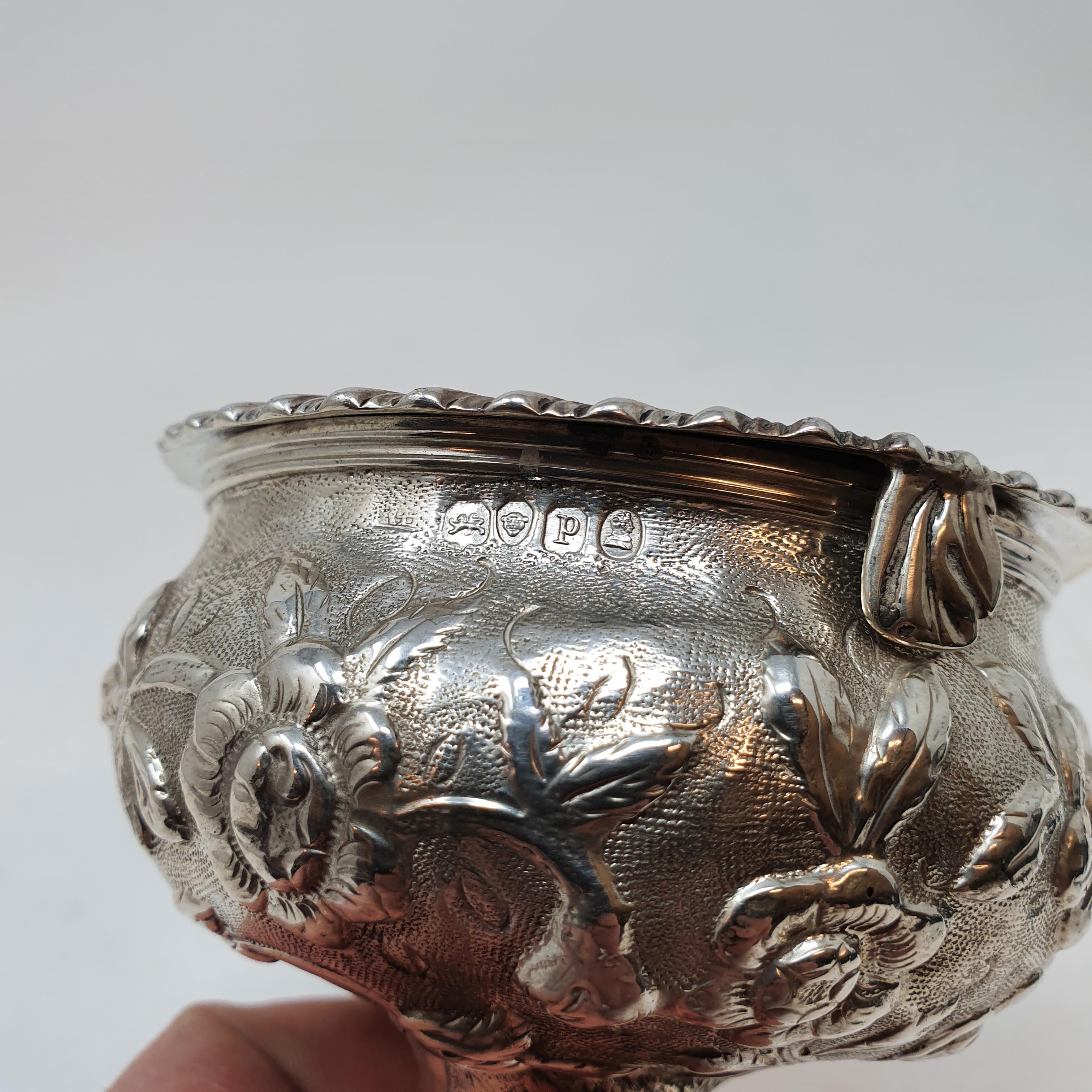 A George III silver wine funnel, crested, and with embossed decoration, London 1810, 12.5 cm high - Image 3 of 3