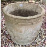 A composite stone garden planter, 46 cm diameter