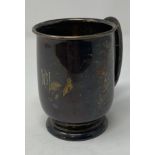 A silver mug, initialled, Sheffield 1936, 6.3 ozt, 9.5 cm high