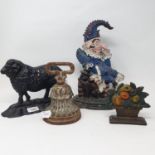 A painted cast metal doorstop in the form of Mr Punch, 33 cm, and three other door stops (4)