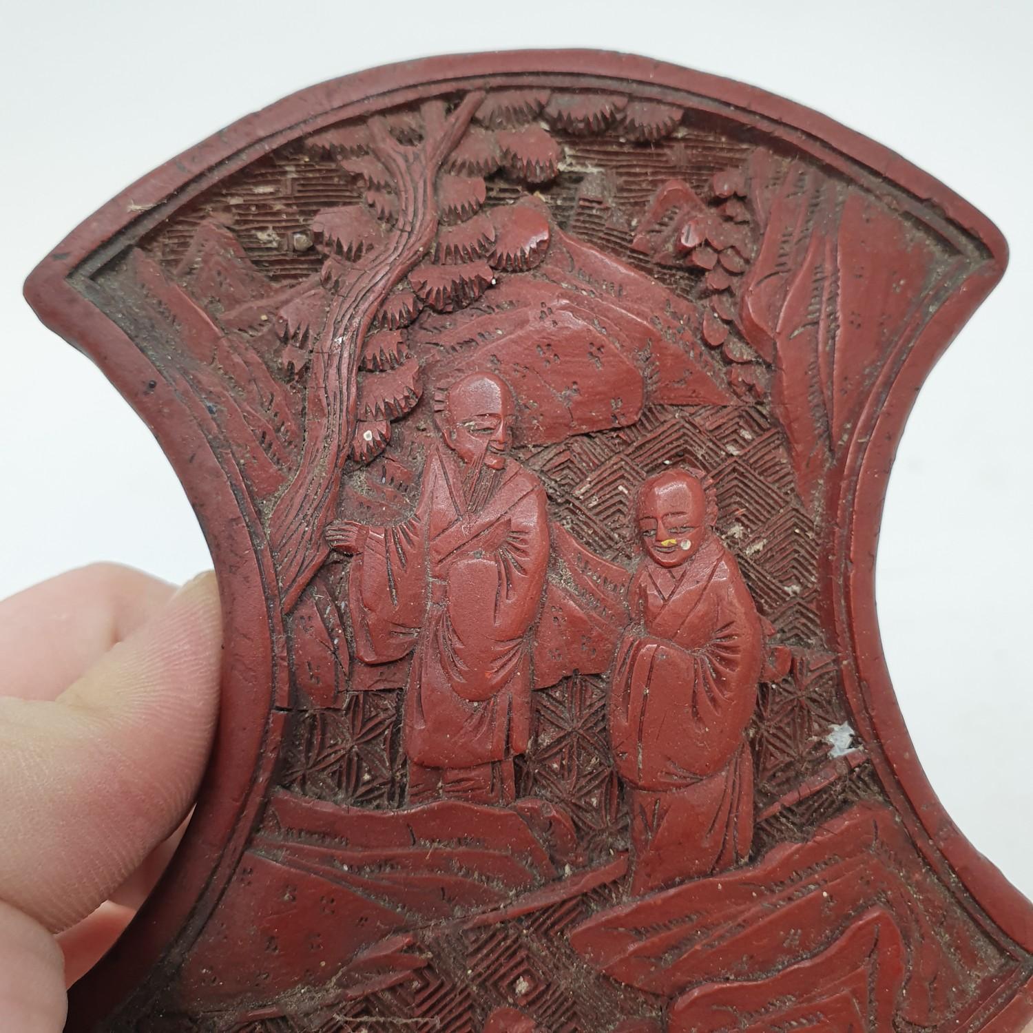 A Chinese cinnabar lacquered box, of shaped form, decorated two figures, 11 cm wide - Image 9 of 10