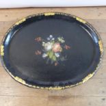 A 19th century papier-mâché oval tray, painted flowers, highlighted in gilt, 78 cm wide Various