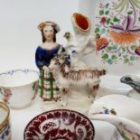 A 19th century Staffordshire figure, of woman and a goat, and various other 19th century and later