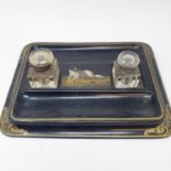 A 19th century lacquered inkstand, painted a dog, highlighted in gilt, 31 cm wide Both ink stands