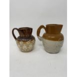 A Doulton Lambeth stoneware jug, decorated flowers, and various other stoneware (qty)