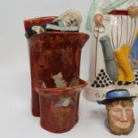 A 19th century Staffordshire figure, the Vicar and Moses, lacking lower figure, 18 cm high, a