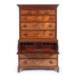A 19th century mahogany secretaire chest on chest, the top having two short and three long