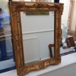 A gilt gesso wall mirror, 88 x 66 cm Various losses to frames, see images
