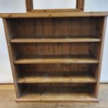A pine bookcase, 105 cm wide, and pine shelf, 65 cm wide (2)