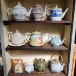A 19th century blue and white teapot, 15 cm high, and nine other teapots (10)