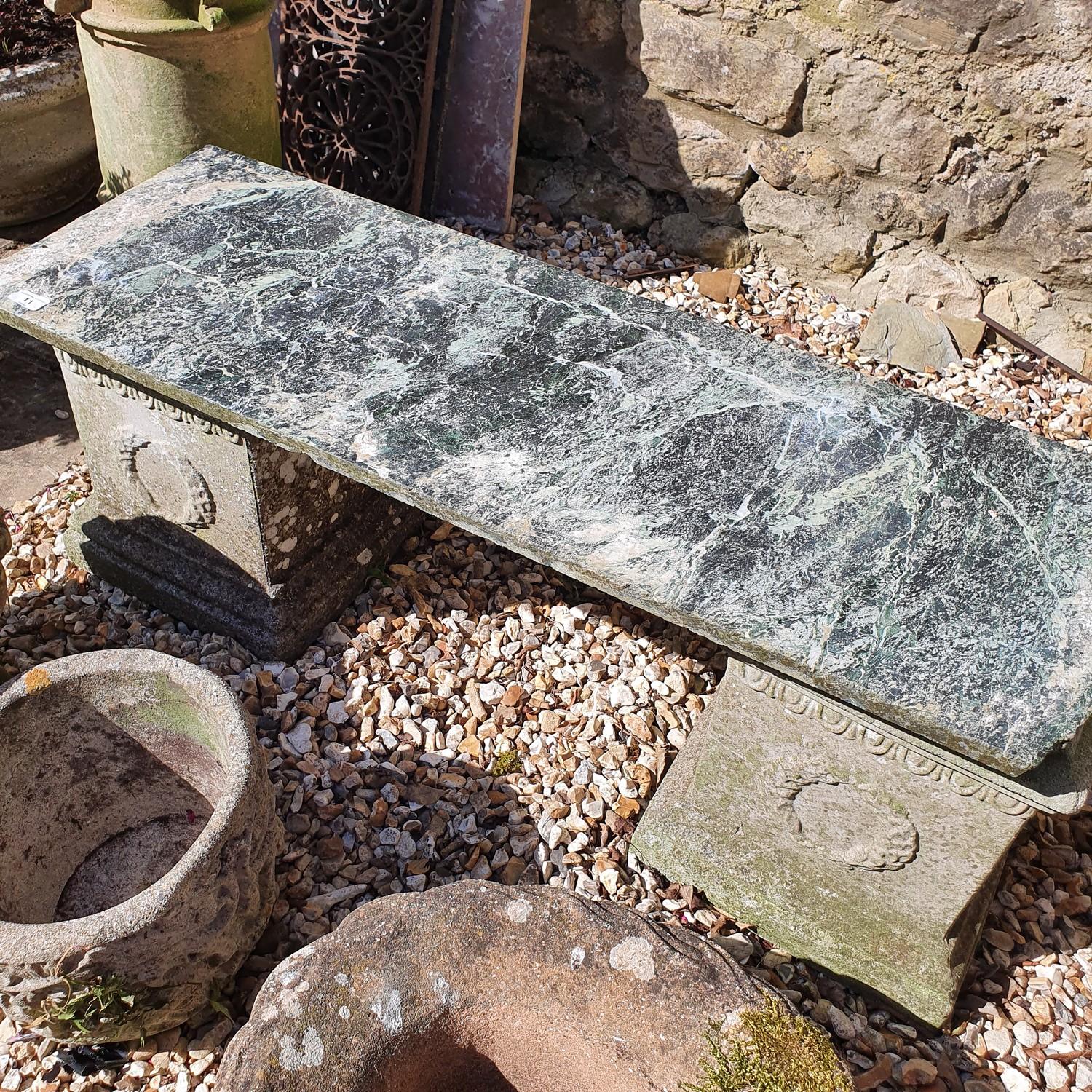 A pair of composite stone garden plinths, 35 cm wide, two marble tops, and two cast metal grates (6)