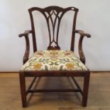 A 19th century mahogany Chippendale style armchair, with a pierced splat back, drop in seat, and