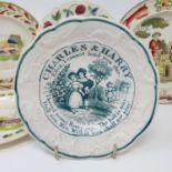 A 19th century nursery plate, Charles & Harry, 13 cm diameter, and four other nursery plates (5)