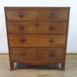 A 19th century mahogany and crossbanded chest having two short and three graduated long drawers on